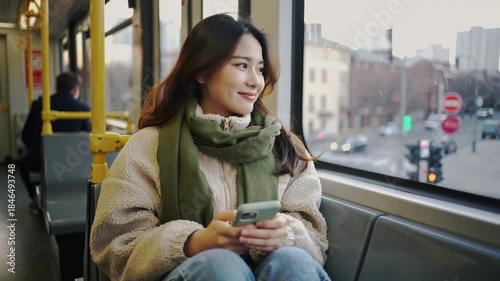 Young asian woman traveling with tram during winter season - City, transportation and urban lifestyle concept - Models by AI generative