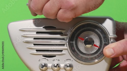 Turn on and set up an authentic 60s radio against green backdrop