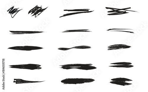 Collection of black brush strokes and marks on white background