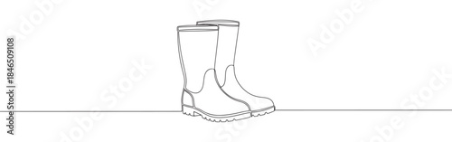 Continuous one line drawing of rubber boots. Vector illustration of rain wellies or gardening footwear isolated on white background. Minimalist autumn concept
