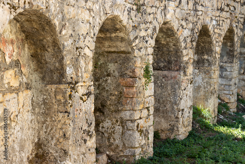 Stone arched wall of a church, Paxos, Greece
