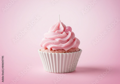 A Sweet Strawberry Swirl Cupcake with Pink Frosting on a Pastel Background