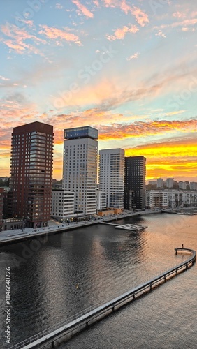 Sunset over the modern city part and architecture of Liljeholmen by Lake Mälaren in Stockholm, Sweden
