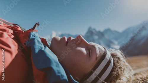 Unconscious injured female mountain climber hiker lying on ground after accident, showing emergency rescue, outdoor adventure risk, wilderness injury, survival challenge, and hiking safety concept