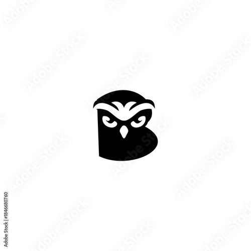 Stylized owl head formed lett...