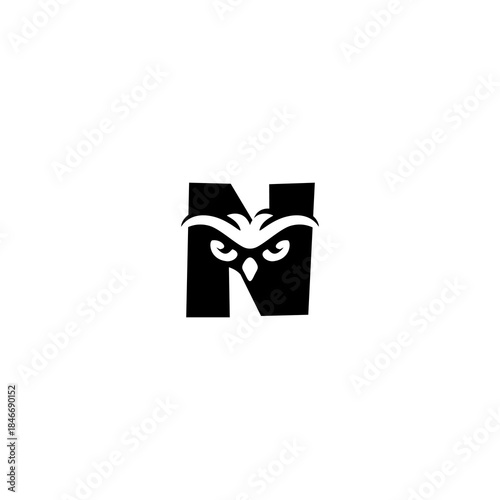 Stylized owl head formed lett...