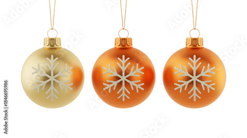 Three gold and orange christmas ornaments with snowflake designs hang from strings