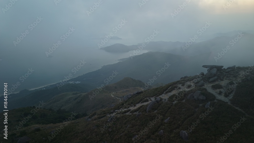 Obraz premium Sunset Peak is a famous trail in Hong Kong. The hike takes about 6 hours round trip.