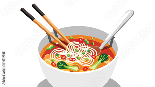 A steaming bowl of ramen with chopsticks and a spoon offers a delicious and comforting culinary experience.