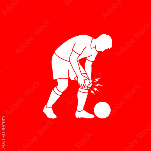 Soccer player clutching knee in pain during match