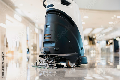 The robot vacuum is working in the mall.