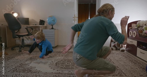 Man Does Exercise Workout with Kid at Home. 4K 10-bit