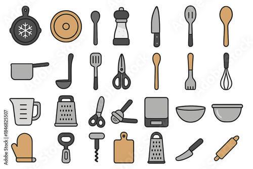 Kitchen tools and utensils arranged on a flat surface for cooking and preparation tasks