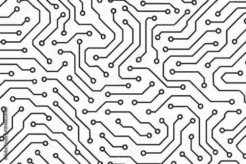 Patterns of circuit lines form a complex design in a black and white layout during daytime