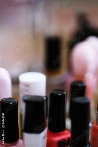 Nail polish bottles close-up macro background
