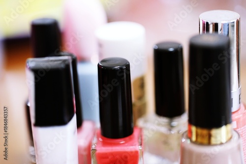 Nail polish bottles close-up macro background