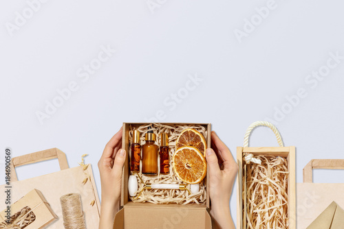 Gift Set With Natural Skincare In Eco Packaging On Pastel Background. Concept Of Organic Beauty Zero Waste Holiday Shopping Sustainable Lifestyle And Branding For Clean Cosmetic Products