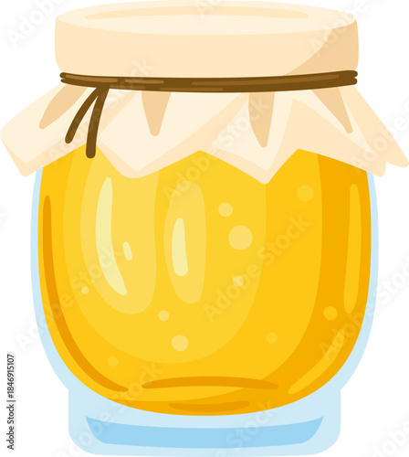 Glass jar holding golden natural organic honey