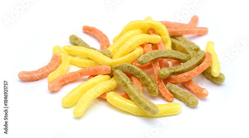 Naturally Baked Veggie Straws Made From Tomatoes, Spinach and Potatoes on white background 