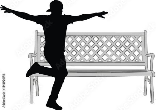 Silhouette of joyful man balancing with outstretched arms near park bench expressing freedom, happiness, confidence, and carefree lifestyle concept