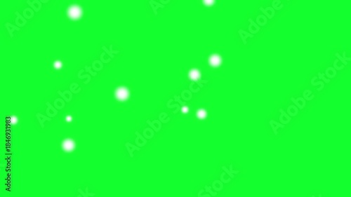 White Globe Abstract green  Background 4K Loop features bokeh light spheres in varying shades of white, Round-shaped white glowing spots with an outline of blue shades alternately pour