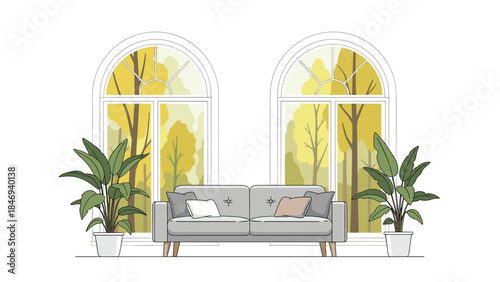 Cozy living room interior features a gray sofa positioned between two arched windows overlooking autumnal trees.