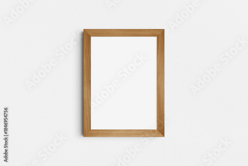 Frame mockup 5x7, 50x70, A4, A3, A2, A1. Single cherry wood frame mockup. Clean, modern, minimalist, bright. Portrait. Vertical.