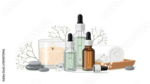 Serene spa arrangement featuring essential oils, a lit candle, smooth stones, and a rolled towel for relaxation and wellness.