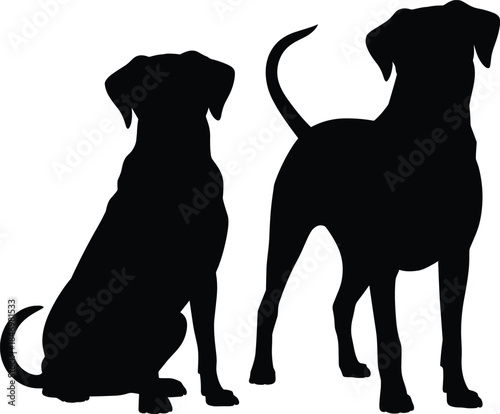 Two black dog silhouettes sitting and standing dogs