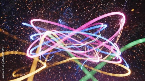 Abstract Swirling Light Trails In Blue Pink Yellow Green Against A Dark Background With Sparkles Creating A Cosmic Effect