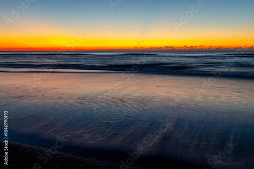 Morning Twilight  at the Beach  with Rays and reflections