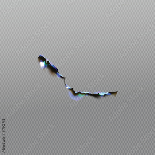 Small tear or puncture mark on a textured gray surface creating a subtle abstract background element