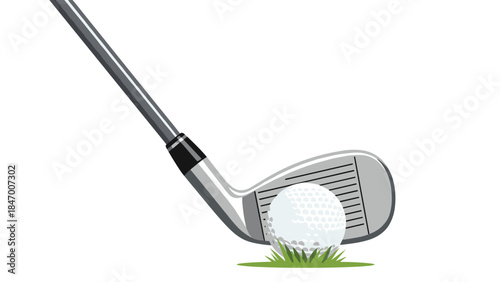 Golf club poised to strike a white golf ball resting on a patch of green grass, illustrating the sport's precision and focus.