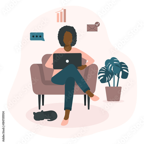 Black woman freelancer with a laptop at home office