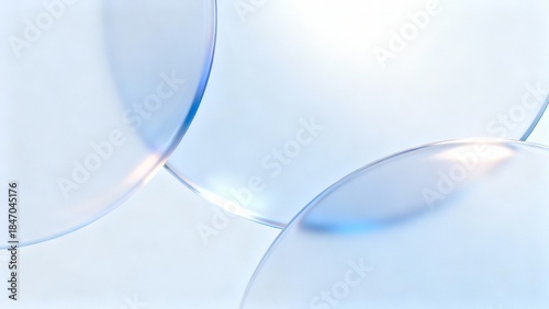 Abstract Translucent Blue Spheres with Soft Light Reflections on a Minimalist Background