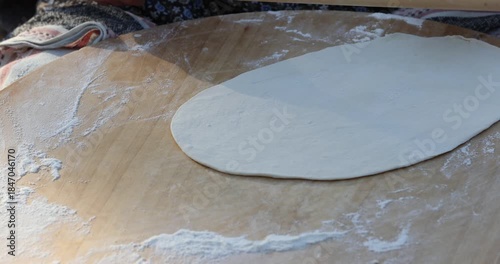 Traditional Turkish Dough Preparation by Woman Hands in Rural Kitchen