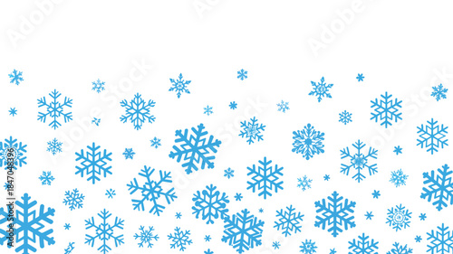 Blue snowflakes falling on white background winter wonderland scene