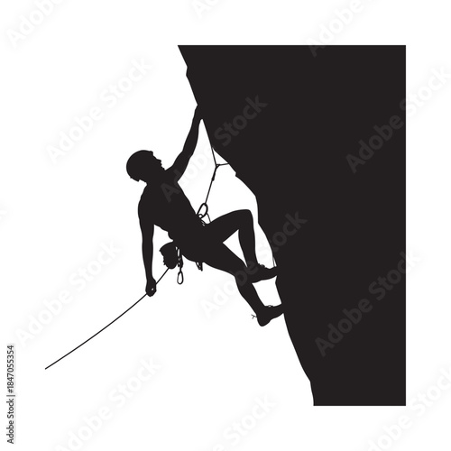 Silhouette of a rock climber ascending a steep dark cliff face