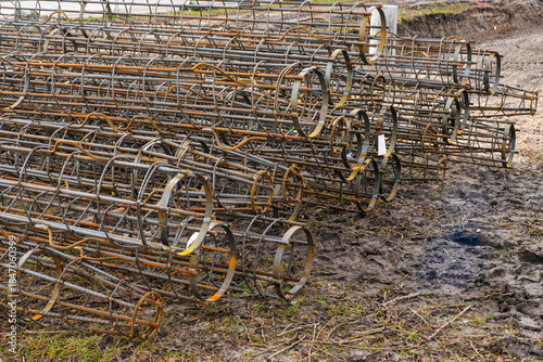 Steel rebar cages stacked on construction site for bored pile foundation and concrete reinforcement