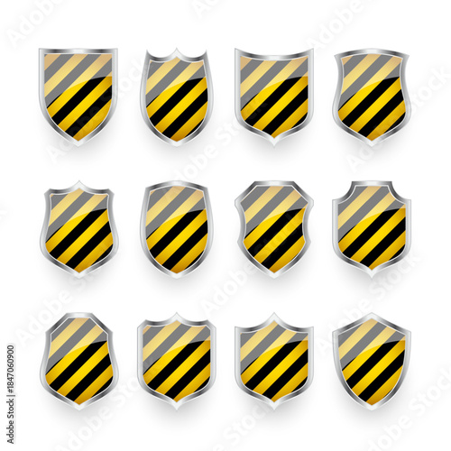 Glossy shields with yellow and black pattern. Security and protection concept. Cyber safety icons, internet privacy, web defense, digital data protection and antivirus themes. Vector illustration