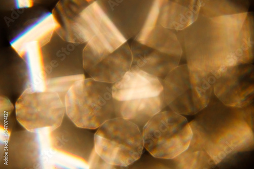 Lens Flare. Light over black background. Easy to add overlay or screen filter over photos. Abstract sun burst with digital lens flare background. Gleams rounded and hexagonal shapes, rainbow halo. big
