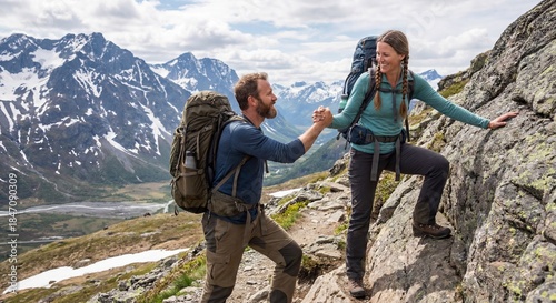 couple friends two people mountain trekking hike climb help hold hand nature concept
