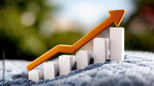 Growth chart with upward trend in nature. A chart shows an upward trend with bars increasing in size, set against a natural background.