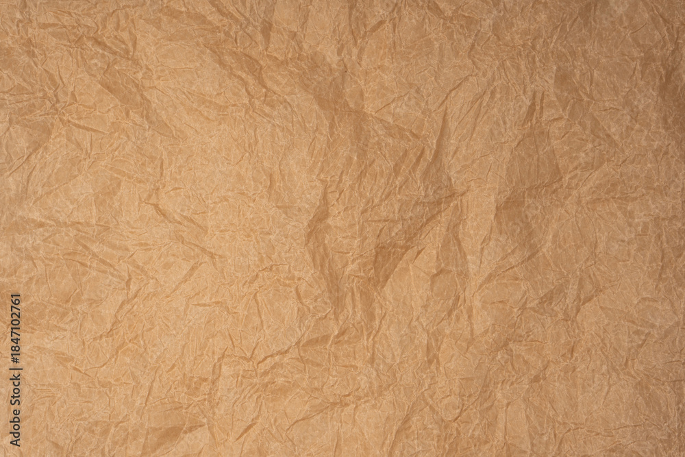 Fototapeta premium Crumpled paper as background. Top view.