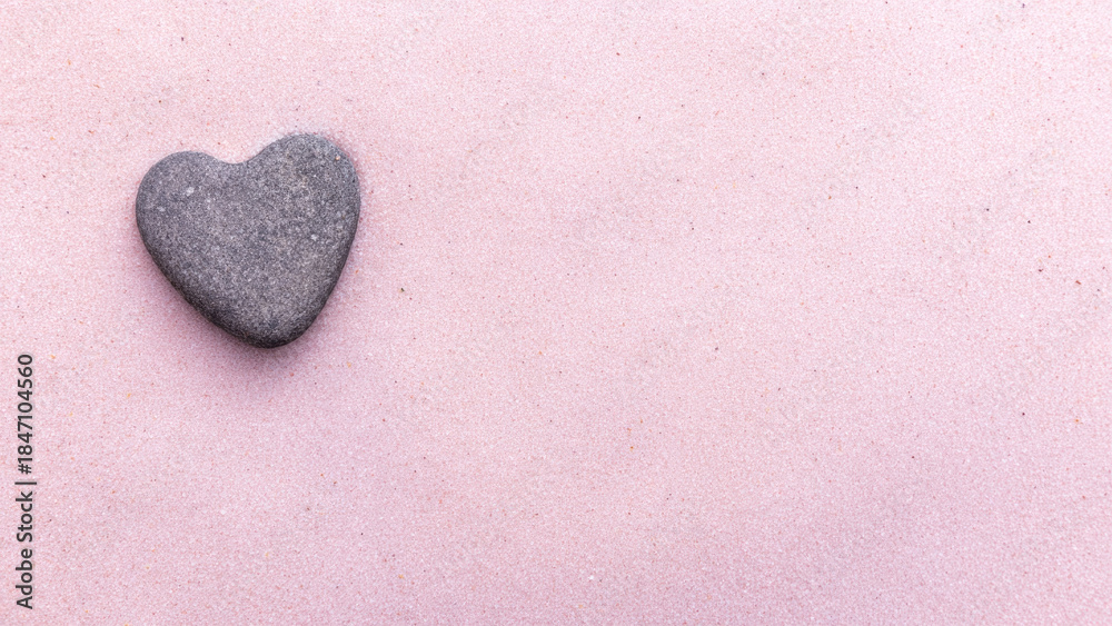 Fototapeta premium Heart Shaped Stone on Sand