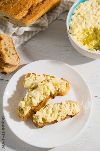 Sandwich with egg and delicious whole grain baguette with sesame seeds. Nutritious breakfast concept