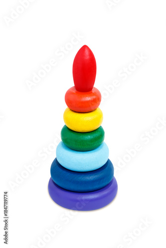 Multicolored wooden toy pyramid on white  background. Toy, build from colored wooden rings.