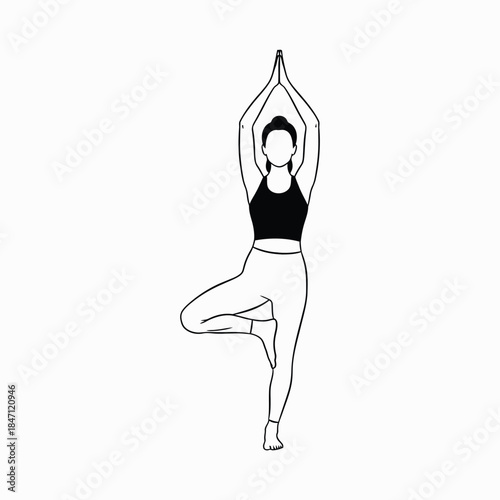A woman performing natarajasana or dancer s pose in yoga with one leg bent and arms raised in a balancing exercise