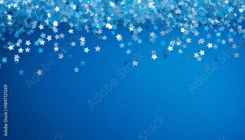 Blue abstract Christmas background or texture with stars confetti on blue background. Space for text