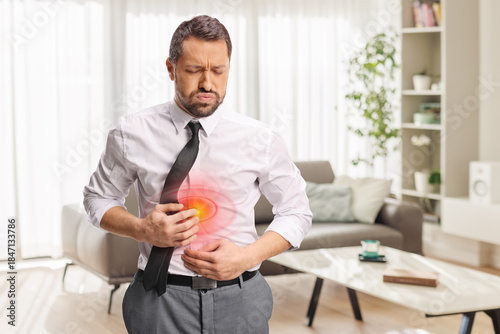 Tableau sur toile Man suffering from indigestion
